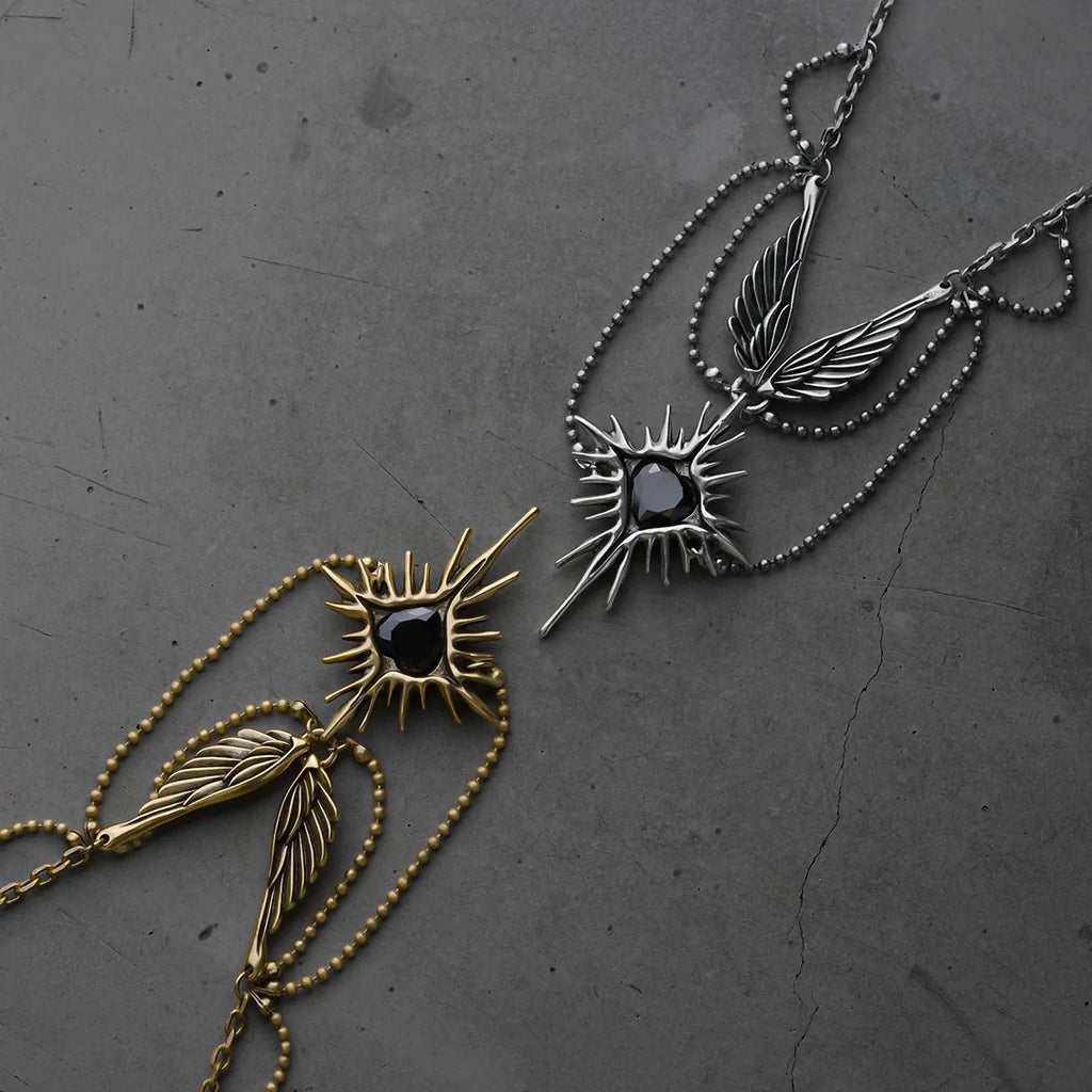 CELESTIAL STARBURST WINGS NECKLACE